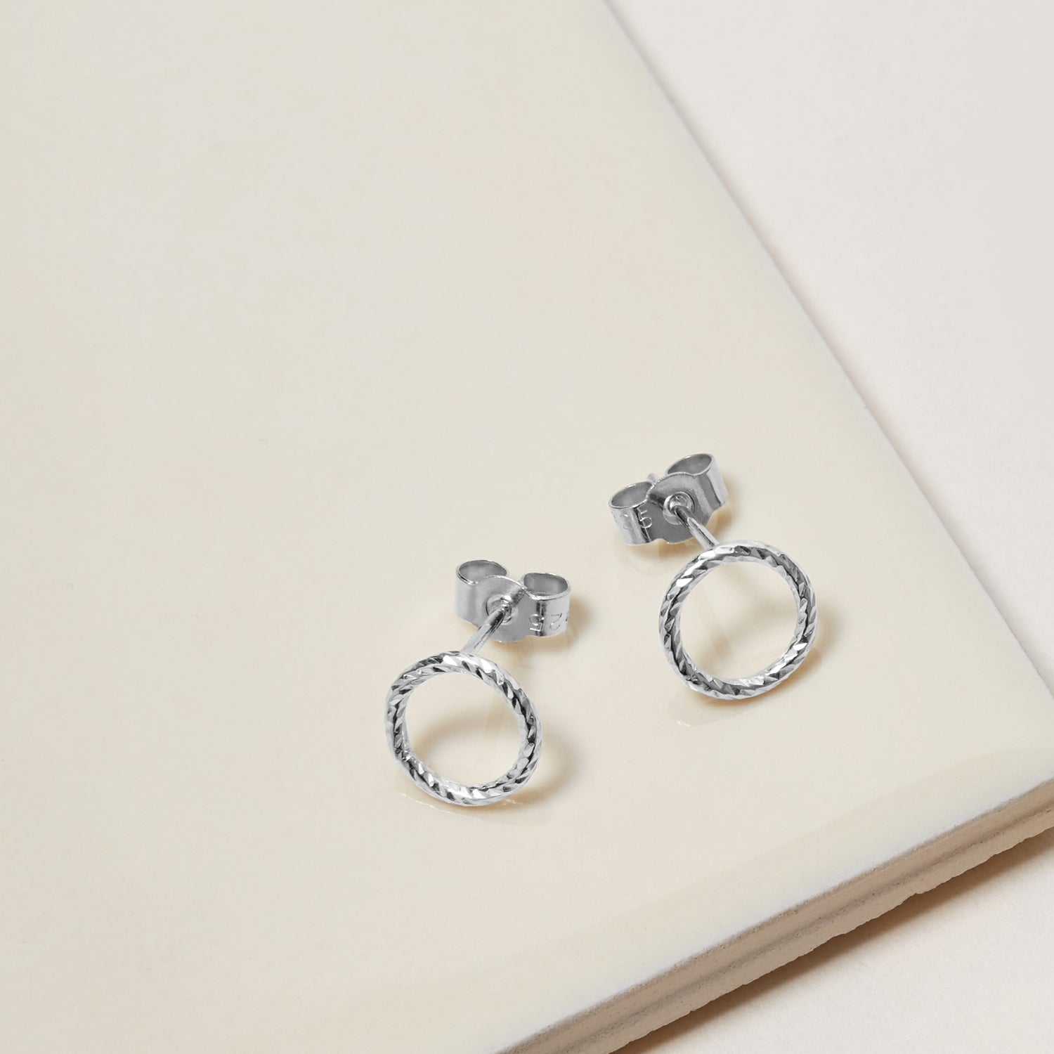 Circle Faceted Stud Earrings - Silver